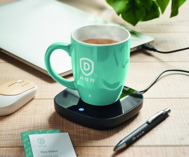 Logo trade mainoslahja ja liikelahja tuotekuva: Mukin lämmitin